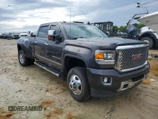 2015 GMC Sierra 3500HD Denali z VIN 1GT424E87FF588292, wystawiony jako Copart lot #65950764 z przebiegiem 128 416 mil mil oraz Szkoda całkowita • Salvage title. Historia ofert i sprzedaży dostępna na DreamBid. Obrazek 1.