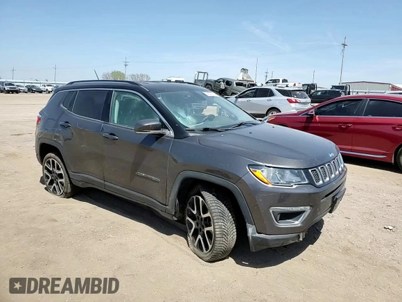 2018 Jeep Compass Limited with VIN 3C4NJDCB9JT261879, listed as a Copart auction lot 56523365 with 172,382 mi miles and Salvage title. Bid and sale history available at DreamBid. Image 14.