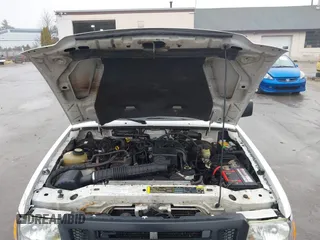 2006 Ford Ranger XL with VIN 1FTYR10D56PA85497, listed as a IAAI auction lot 41851389 with 198,399 mi miles. Bid and sale history available at carsss.com. Image 10.