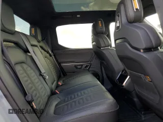 2023 Rivian R1T Adventure with VIN 7FCTGBAA2PN028983, listed as a Copart auction lot 45307015 with 220 mi miles and Salvage Title. Bid and sale history available at DreamBid. Image 10.
