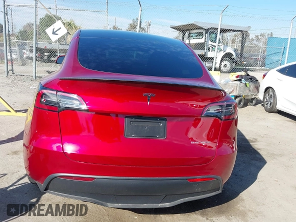 2024 Tesla Model Y Performance with VIN 7SAYGDEF3RF032980, listed as a IAAI auction lot 41619450 with 12,105 mi miles and . Bid and sale history available at DreamBid. Image 16.