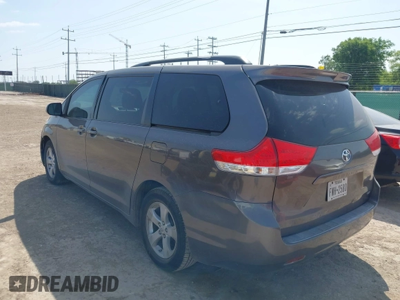 2012 Toyota Sienna LE AAS with VIN 5TDKK3DC8CS180967, listed as a IAAI auction lot 42215961 with 220,089 mi miles and . Bid and sale history available at DreamBid. Image 3.