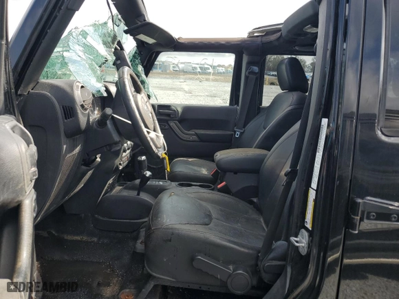 2013 Jeep Wrangler Unlimited Sahara with VIN 1C4HJWEG1DL612205, listed as a Copart auction lot 42210585 with 102,255 mi miles and Salvage Title. Bid and sale history available at carsss.com. Image 7.