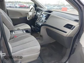 2012 Toyota Sienna LE AAS with VIN 5TDKK3DC5CS270481, listed as a IAAI auction lot 42093687 with 208,899 mi miles. Bid and sale history available at carsss.com. Image 5.