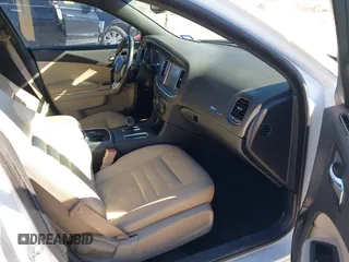 2014 Dodge Charger SXT with VIN 2C3CDXHG2EH104640, listed as a IAAI auction lot 41379760 with 122,664 mi miles and . Bid and sale history available at DreamBid. Image 5.