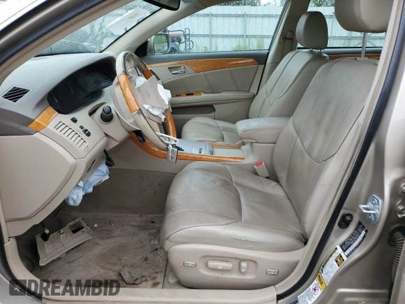 2007 Toyota Avalon XL z VIN 4T1BK36B97U189386, wystawiony jako Copart lot #55917365 z przebiegiem Nie podano mil oraz Szkoda całkowita • Salvage title. Historia ofert i sprzedaży dostępna na DreamBid. Obrazek 7.