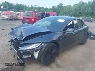 2025 Tesla Model 3 Long Range with VIN 5YJ3E1EB2SF899446, listed as a IAAI auction lot 42478353 with Not provided miles and . Bid and sale history available at DreamBid. Image 2.