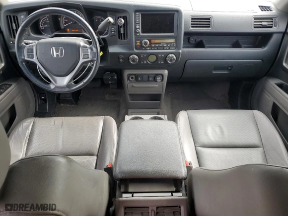 2010 Honda Ridgeline RTL with VIN 5FPYK1F50AB005120, listed as a Copart auction lot 53569115 with 173,878 mi miles and Salvage Title. Bid and sale history available at carsss.com. Image 8.