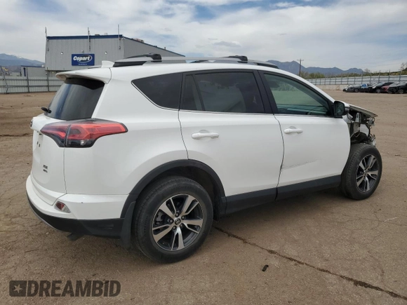 2018 Toyota RAV4 XLE with VIN 2T3RFREV2JW733050, listed as a Copart auction lot 53114585 with Not Provided miles and Salvage Title. Bid and sale history available at DreamBid. Image 3.