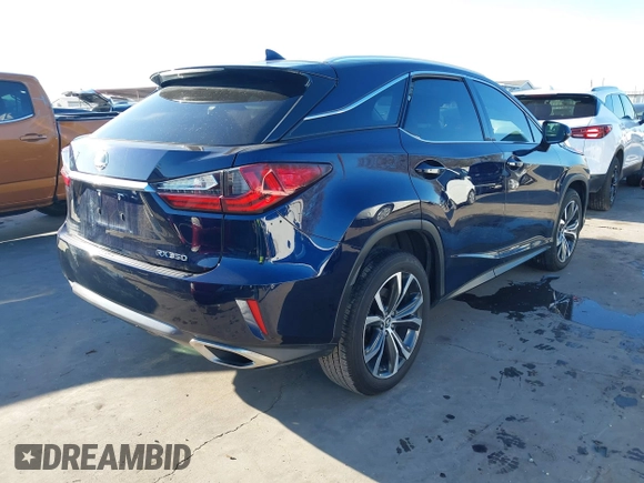 2018 Lexus RX with VIN 2T2ZZMCA2JC110964, listed as a IAAI auction lot 41142683 with 68,667 mi miles. Bid and sale history available at carsss.com. Image 4.