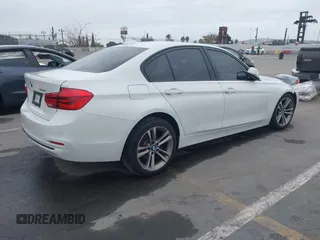 2016 BMW 3 Series 328i with VIN WBA8E9G5XGNT86382, listed as a IAAI auction lot 42056602 with 149,452 mi miles. Bid and sale history available at carsss.com. Image 4.