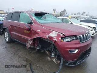 2021 Jeep Grand Cherokee Laredo X with VIN 1C4RJEAG4MC681989, listed as a IAAI auction lot 41571341 with 61,090 mi miles and . Bid and sale history available at DreamBid. Image 1.