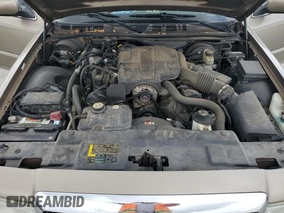 2004 Mercury Grand Marquis LS Premium z VIN 2MEFM75W14X689346, wystawiony jako Copart lot #52676325 z przebiegiem 127 676 mil mil oraz Szkoda całkowita • Salvage title. Historia ofert i sprzedaży dostępna na DreamBid. Obrazek 12.