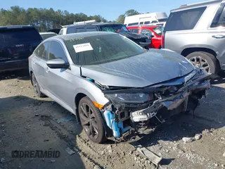 2019 Honda Civic Sport with VIN 19XFC2F88KE034868, listed as a IAAI auction lot 41913004 with 60,599 mi miles and . Bid and sale history available at DreamBid. Image 1.