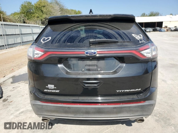 2015 Ford Edge Titanium z VIN 2FMTK3K87FBB38309, wystawiony jako Copart lot #79662514 z przebiegiem 185 342 mil mil oraz Szkoda całkowita • Salvage title. Historia ofert i sprzedaży dostępna na DreamBid. Obrazek 6.