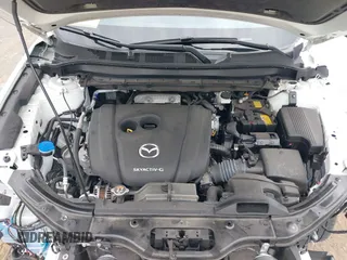 2022 Mazda CX-5 2.5 S Premium Plus Package with VIN JM3KFBEM2N0616960, listed as a IAAI auction lot 42127024 with 30,565 mi miles. Bid and sale history available at carsss.com. Image 10.
