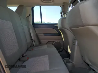2011 Jeep Patriot Latitude z VIN 1J4NF1GB0BD131856, wystawiony jako Copart lot #56222005 z przebiegiem 172 231 mil mil oraz Szkoda całkowita • Salvage title. Historia ofert i sprzedaży dostępna na DreamBid. Obrazek 11.