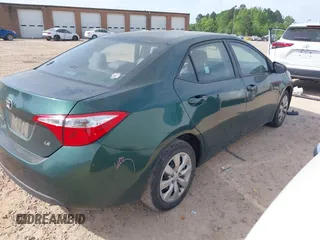2016 Toyota Corolla L with VIN 2T1BURHE8GC697564, listed as a IAAI auction lot 42039659 with 112,672 mi miles and . Bid and sale history available at DreamBid. Image 4.