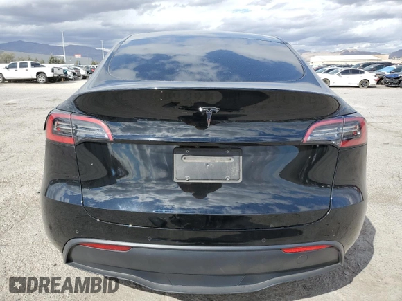 2021 Tesla Model Y Long Range with VIN 5YJYGDEEXMF188737, listed as a Copart auction lot 49117605 with 49,201 mi miles and Salvage Title. Bid and sale history available at DreamBid. Image 6.