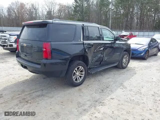 2016 Chevrolet Tahoe LT with VIN 1GNSCBKCXGR100381, listed as a IAAI auction lot 41542315 with 228,506 mi miles. Bid and sale history available at carsss.com. Image 4.