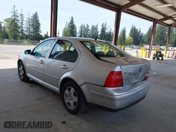 2000 Volkswagen Jetta GLS z VIN 3VWSA29M4YM195775, wystawiony jako IAAI lot #42131518 z przebiegiem 314 472 mil mil oraz . Historia ofert i sprzedaży dostępna na DreamBid. Obrazek 3.