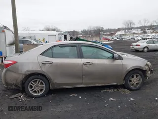 2015 Toyota Corolla L z VIN 2T1BURHE0FC468259, wystawiony jako IAAI lot #41559030 z przebiegiem 299 557 mil mil oraz . Historia ofert i sprzedaży dostępna na DreamBid. Obrazek 13.