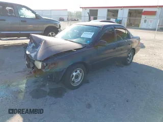 1997 Toyota Corolla with VIN 1NXBA02EXVZ634474, listed as a IAAI auction lot 41492504 with 147,080 mi miles and . Bid and sale history available at DreamBid. Image 2.
