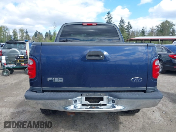 2003 Ford F-150 XLT with VIN 1FTRW08L93KD64270, listed as a IAAI auction lot 42088905 with 181,528 mi miles. Bid and sale history available at carsss.com. Image 16.