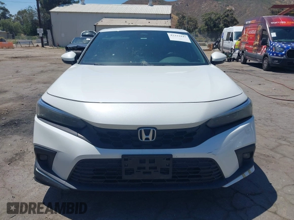 2022 Honda Civic Sport Touring z VIN 19XFL1G82NE000678, wystawiony jako IAAI lot #42221847 z przebiegiem 90 869 mil mil oraz . Historia ofert i sprzedaży dostępna na DreamBid. Obrazek 12.