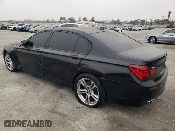 2013 BMW 7 Series 740Li with VIN WBAYE4C51DD137687, listed as a Copart auction lot 76103944 with 134,609 mi miles and Salvage title. Bid and sale history available at DreamBid. Image 2.
