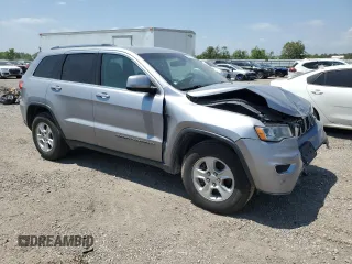 2017 Jeep Grand Cherokee Laredo with VIN 1C4RJEAG0HC816410, listed as a Copart auction lot 52909905 with 102,326 mi miles and Salvage title. Bid and sale history available at DreamBid. Image 4.