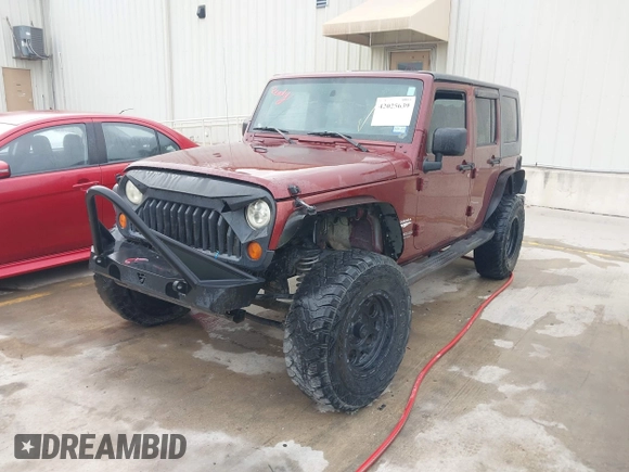 2007 Jeep Wrangler Unlimited Sahara with VIN 1J4GB59197L142223, listed as a IAAI auction lot 42025639 with 155,274 mi miles and . Bid and sale history available at DreamBid. Image 17.
