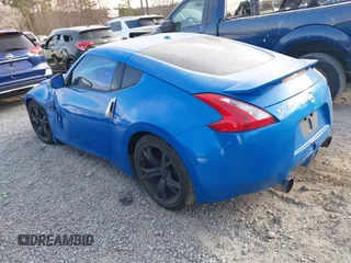 2009 Nissan 370Z Touring with VIN JN1AZ44E39M400201, listed as a IAAI auction lot 41710283 with 245,735 mi miles and . Bid and sale history available at DreamBid. Image 3.