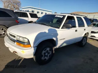 2003 Chevrolet Blazer LS z VIN 1GNDT13X53K113210, wystawiony jako Copart lot #86111974 z przebiegiem Nie podano mil oraz Szkoda całkowita • Salvage title. Historia ofert i sprzedaży dostępna na DreamBid. Obrazek 1.