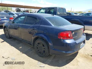 2014 Dodge Avenger SE with VIN 1C3CDZAB2EN129927, listed as a IAAI auction lot 42087663 with 197,339 mi miles. Bid and sale history available at carsss.com. Image 3.