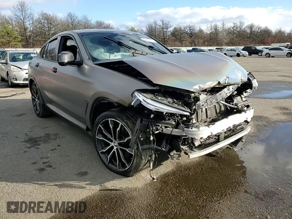 2021 BMW X4 M40i z VIN 5UX2V5C08M9F52562, wystawiony jako Copart lot #83665674 z przebiegiem Nie podano mil oraz Szkoda całkowita • Salvage title. Historia ofert i sprzedaży dostępna na DreamBid. Obrazek 11.