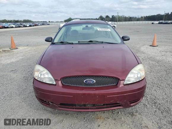 2005 Ford Taurus SE with VIN 1FAFP53205A282454, listed as a Copart auction lot 51052425 with 116,706 mi miles and Salvage Title. Bid and sale history available at carsss.com. Image 5.