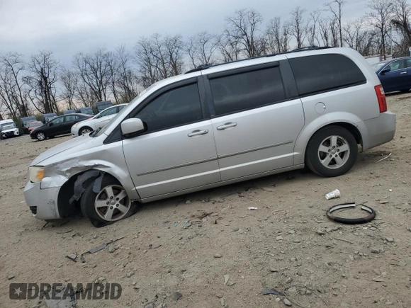 2010 Dodge Grand Caravan SXT with VIN 2D4RN5D14AR118765, listed as a Copart auction lot 50819035 with 162,041 mi miles and Salvage Title. Bid and sale history available at DreamBid. Image 1.