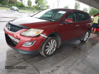 2010 Mazda CX-9 Sport with VIN JM3TB2MAXA0205677, listed as a IAAI auction lot 42617960 with 220,581 mi miles and . Bid and sale history available at DreamBid. Image 2.