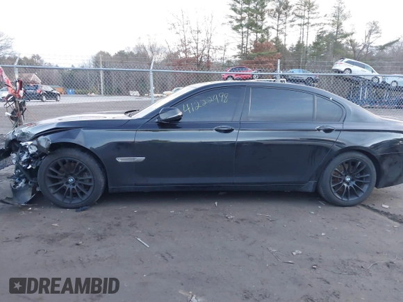 2015 BMW 7 Series 740Li xDrive with VIN WBAYF4C51FGS99074, listed as a IAAI auction lot 41222498 with 132,789 mi miles. Bid and sale history available at carsss.com. Image 14.