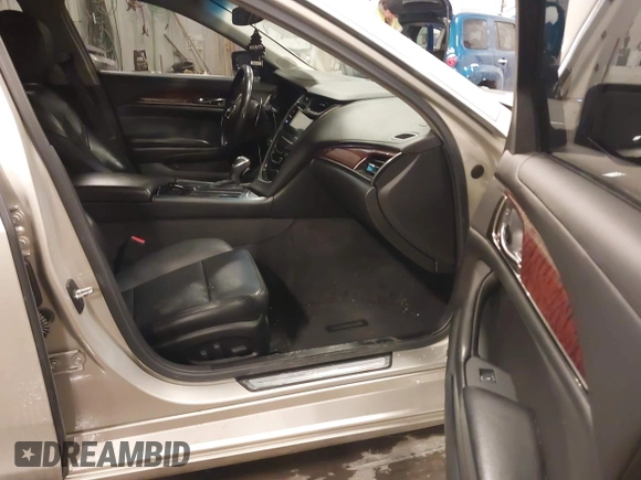 2014 Cadillac CTS Luxury AWD with VIN 1G6AX5S3XE0197628, listed as a IAAI auction lot 41400988 with 144,026 mi miles and . Bid and sale history available at DreamBid. Image 5.