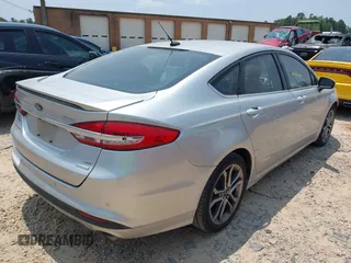 2017 Ford Fusion SE with VIN 3FA6P0HD5HR309221, listed as a IAAI auction lot 42667616 with 126,022 mi miles and . Bid and sale history available at DreamBid. Image 4.