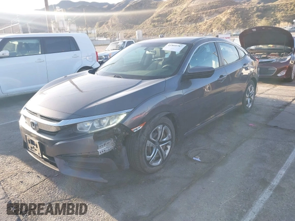 2016 Honda Civic Sedan LX with VIN 2HGFC2F55GH532108, listed as a IAAI auction lot 41860382 with 124,106 mi miles. Bid and sale history available at carsss.com. Image 17.