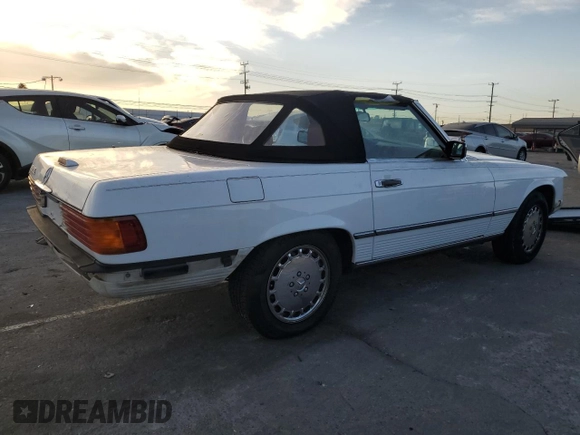 1989 Mercedes-Benz 560 Series 560SL with VIN WDBBA48D7KA100290, listed as a Copart auction lot 85049924 with 88,919 mi miles and Salvage Title. Bid and sale history available at carsss.com. Image 3.