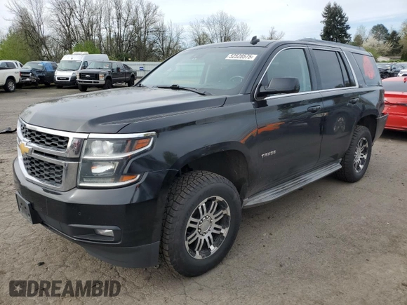 2015 Chevrolet Tahoe LT z VIN 1GNSKBKC8FR102132, wystawiony jako Copart lot #52528575 z przebiegiem 210 201 mil mil oraz Szkoda całkowita • Salvage title. Historia ofert i sprzedaży dostępna na DreamBid. Obrazek 1.
