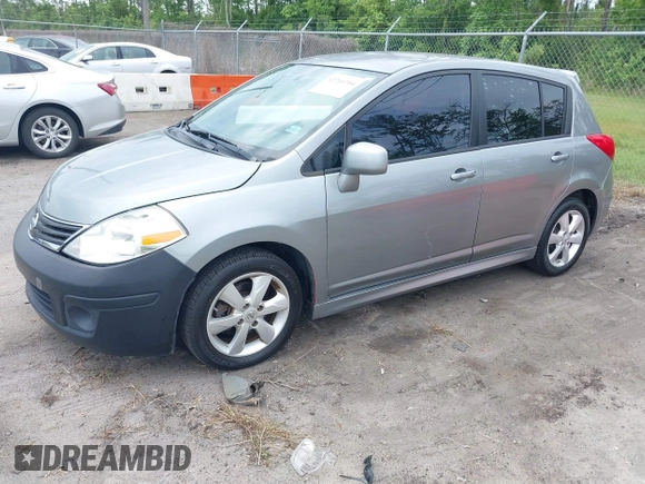2012 Nissan Versa S with VIN 3N1BC1CP9CK239898, listed as a IAAI auction lot 42210704 with 97,714 mi miles and . Bid and sale history available at DreamBid. Image 2.