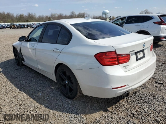 2013 BMW 3 Series 320i xDrive with VIN WBA3C3C5XDF980169, listed as a Copart auction lot 52717675 with 119,297 mi miles and Salvage title. Bid and sale history available at DreamBid. Image 2.