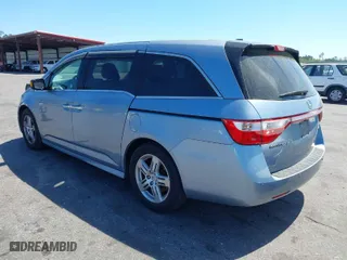 2013 Honda Odyssey Touring with VIN 5FNRL5H94DB069716, listed as a IAAI auction lot 41901369 with 243,492 mi miles. Bid and sale history available at carsss.com. Image 3.