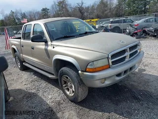 2002 Dodge Dakota SLT with VIN 1B7HG48N82S616607, listed as a IAAI auction lot 41837480 with 328,430 mi miles. Bid and sale history available at carsss.com. Image 1.