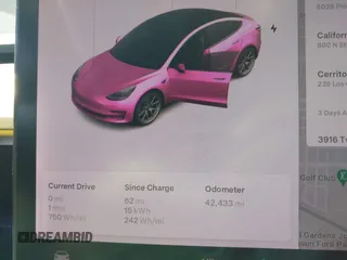 2020 Tesla Model 3 Standard Range Plus with VIN 5YJ3E1EA1LF659765, listed as a IAAI auction lot 41834411 with 42,433 mi miles and . Bid and sale history available at carsss.com. Image 7.